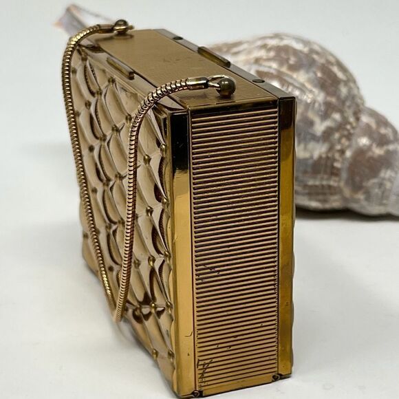 Vintage, gold tone compact/purse.  